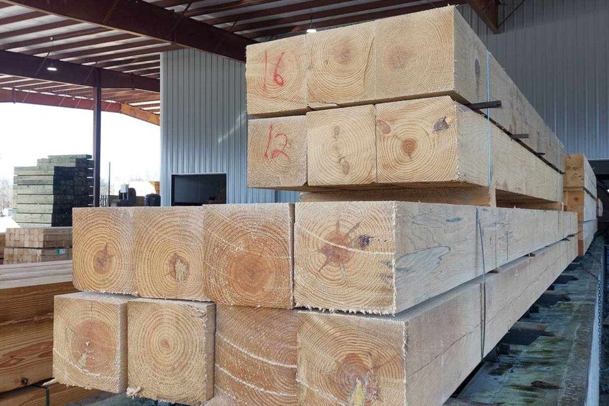 http://Stack%20of%20treated%20lumber